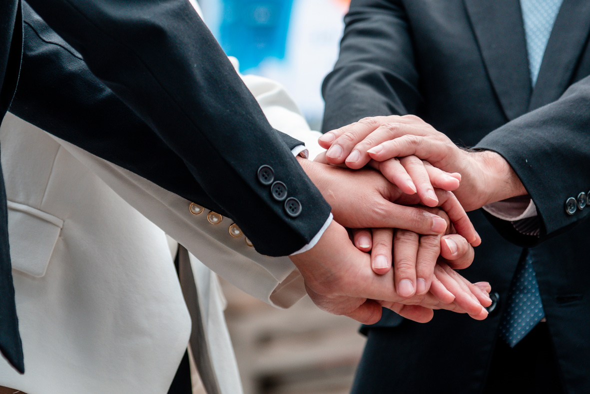 Partner Business Trust Teamwork Partnership. Industry contractor fist bump dealing mission business. Mission team meeting group of People Fist bump Hands together. Business industry trust teamwork
